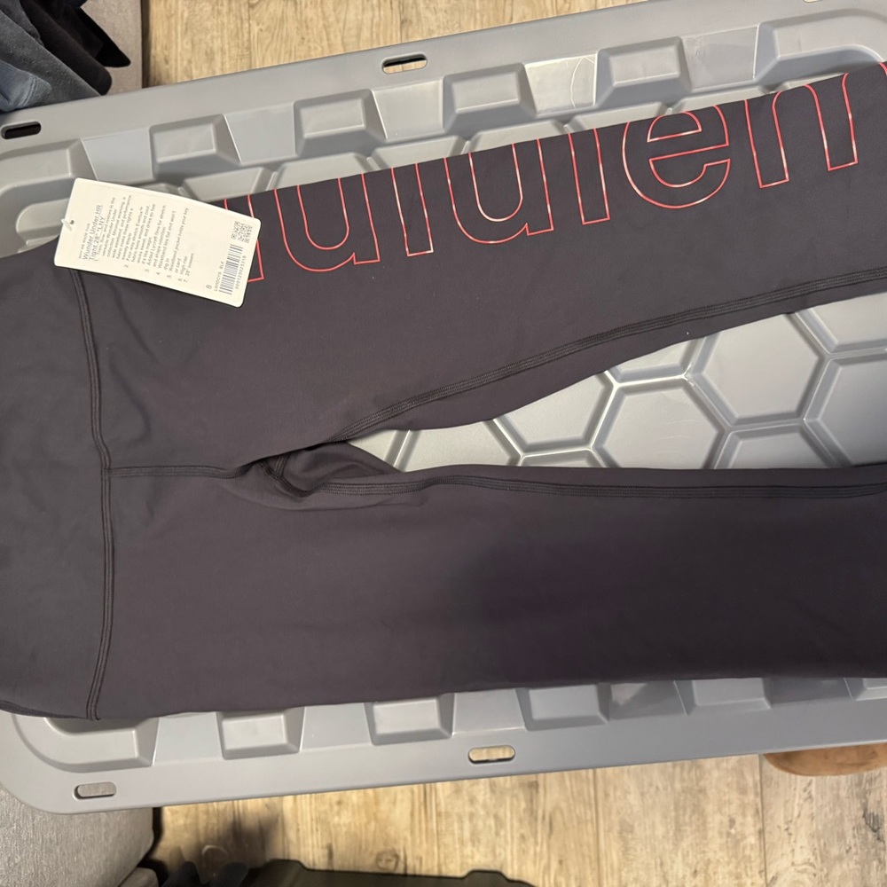 Lululemon Black Wunder Under HR Tights with Red Accents